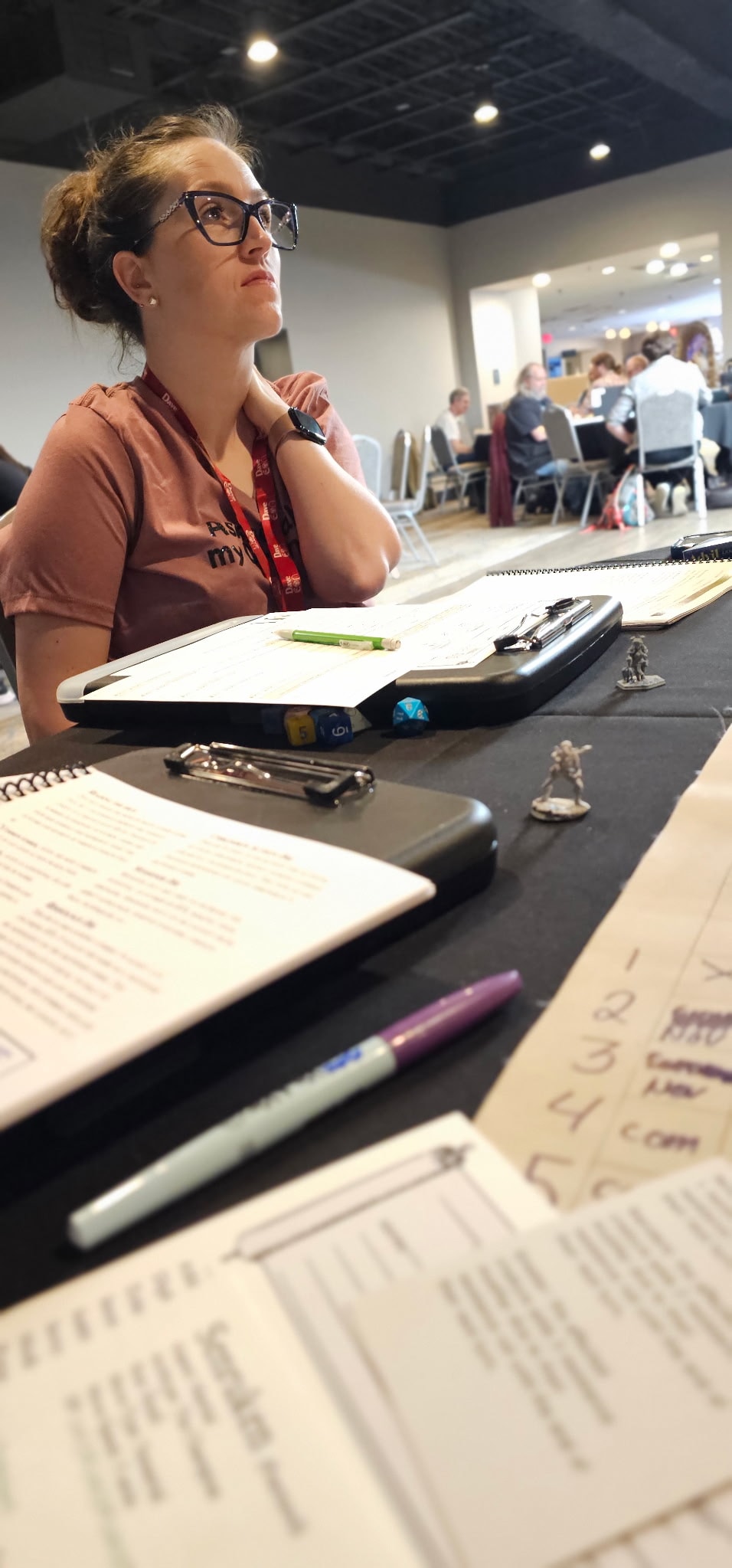 Player deep in thought during a Chronicles of Myth session